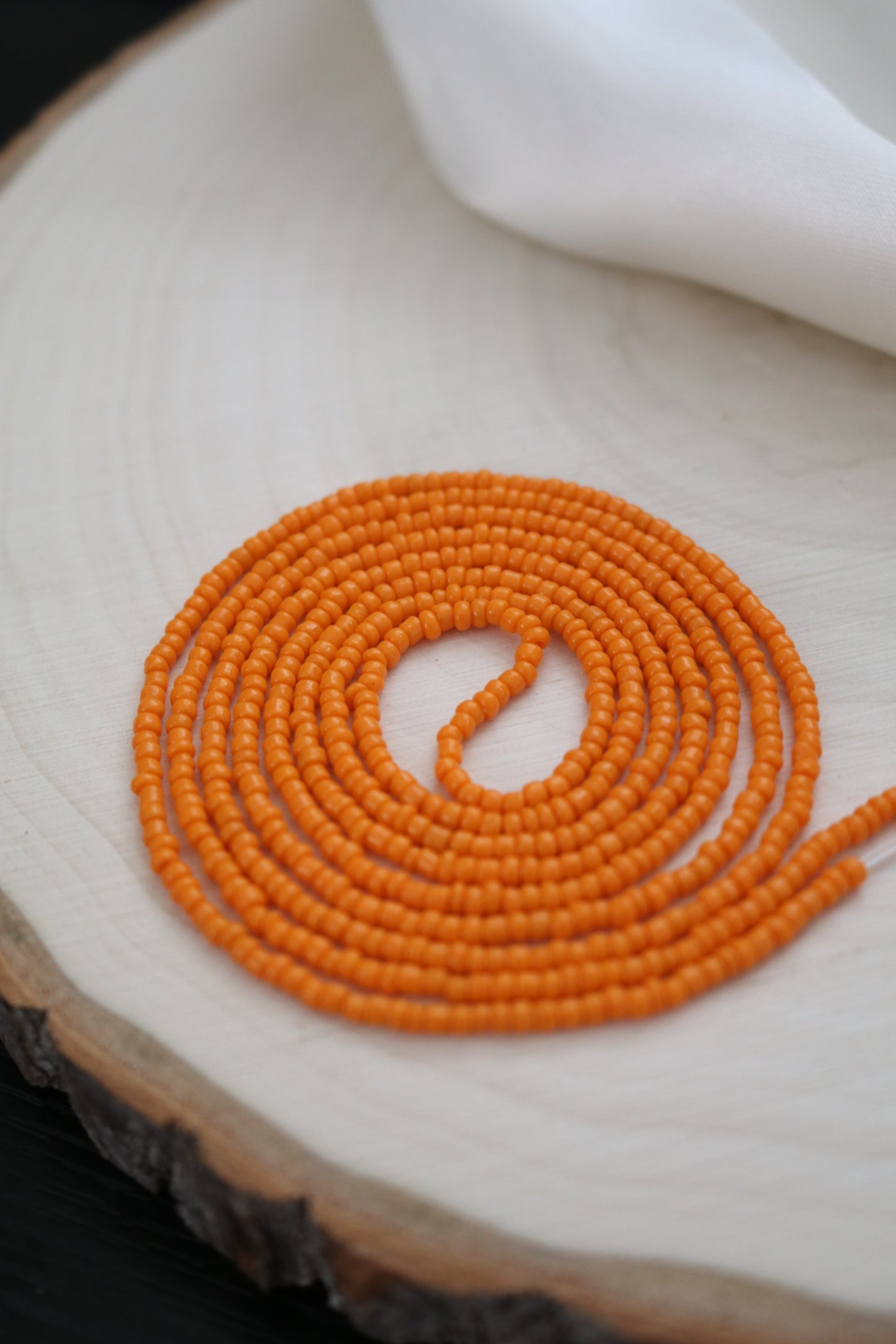 Light Orange Petite Bead