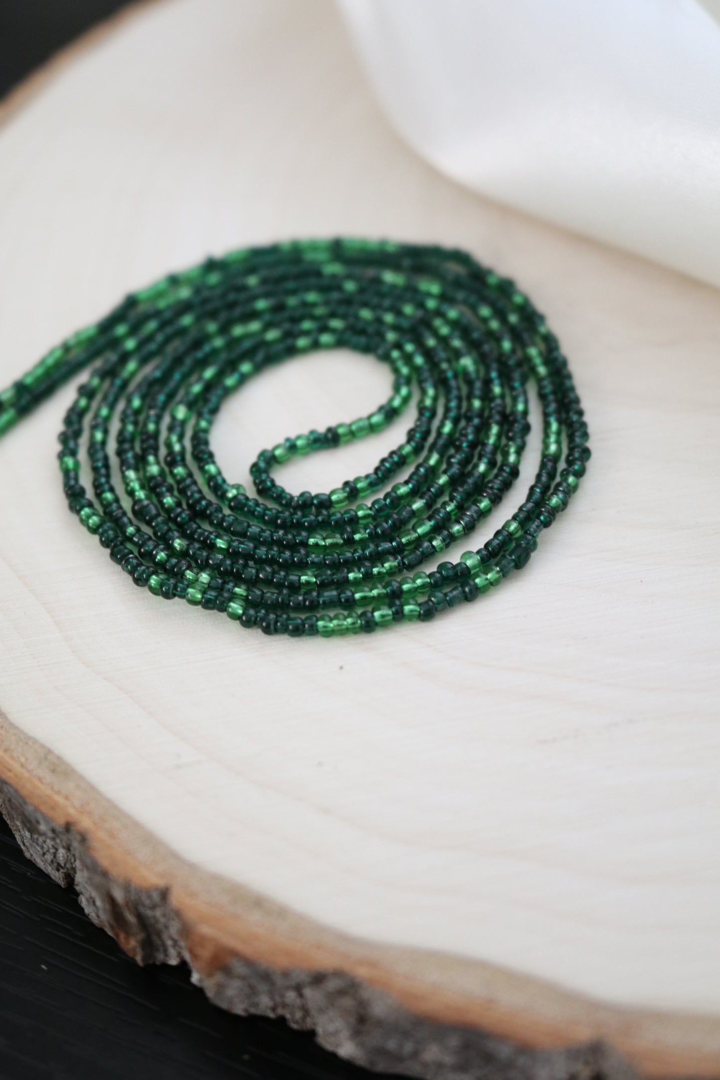 Translucent Green Petite Bead Solid Strand