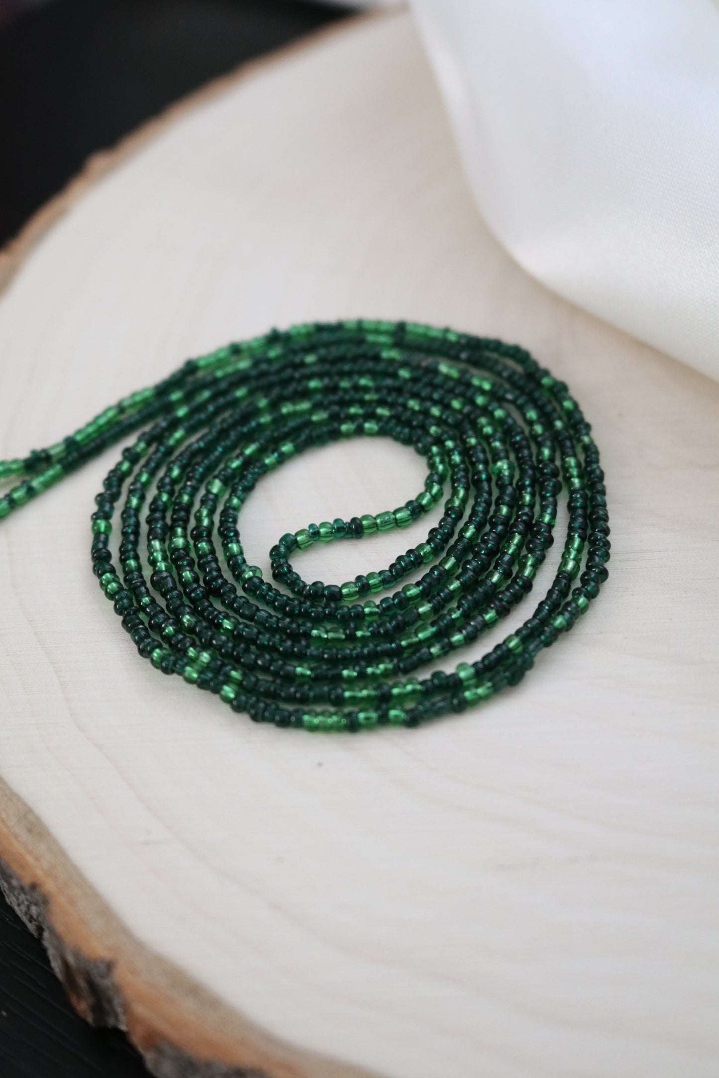 Translucent Green Petite Bead Solid Strand