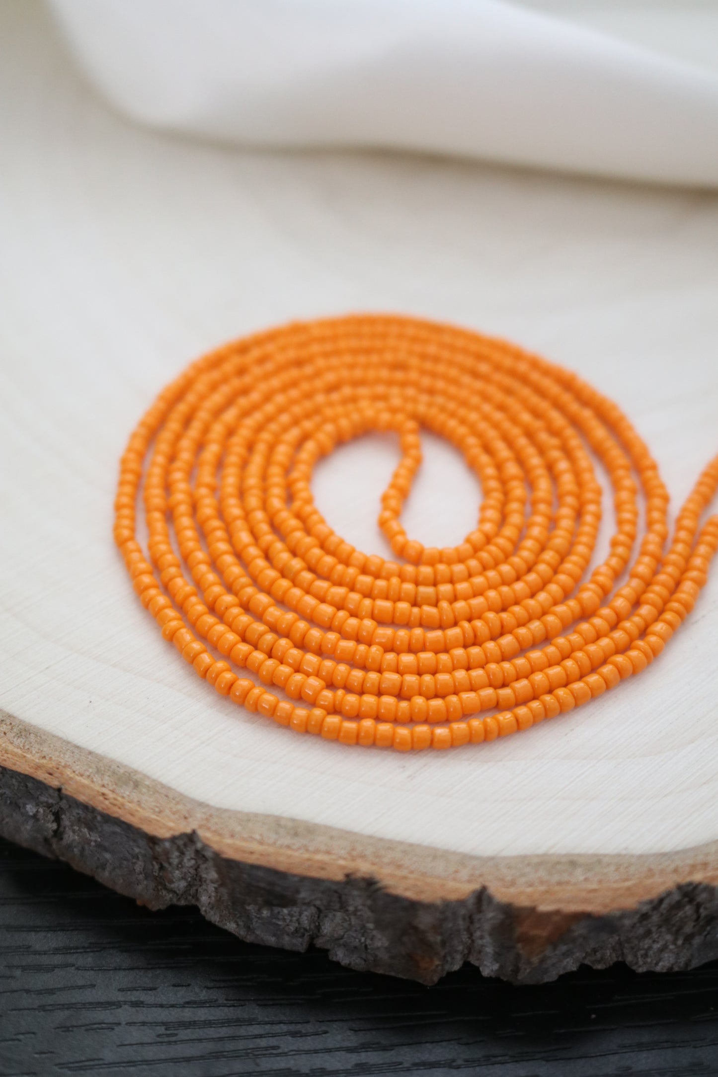 Light Orange Petite Bead